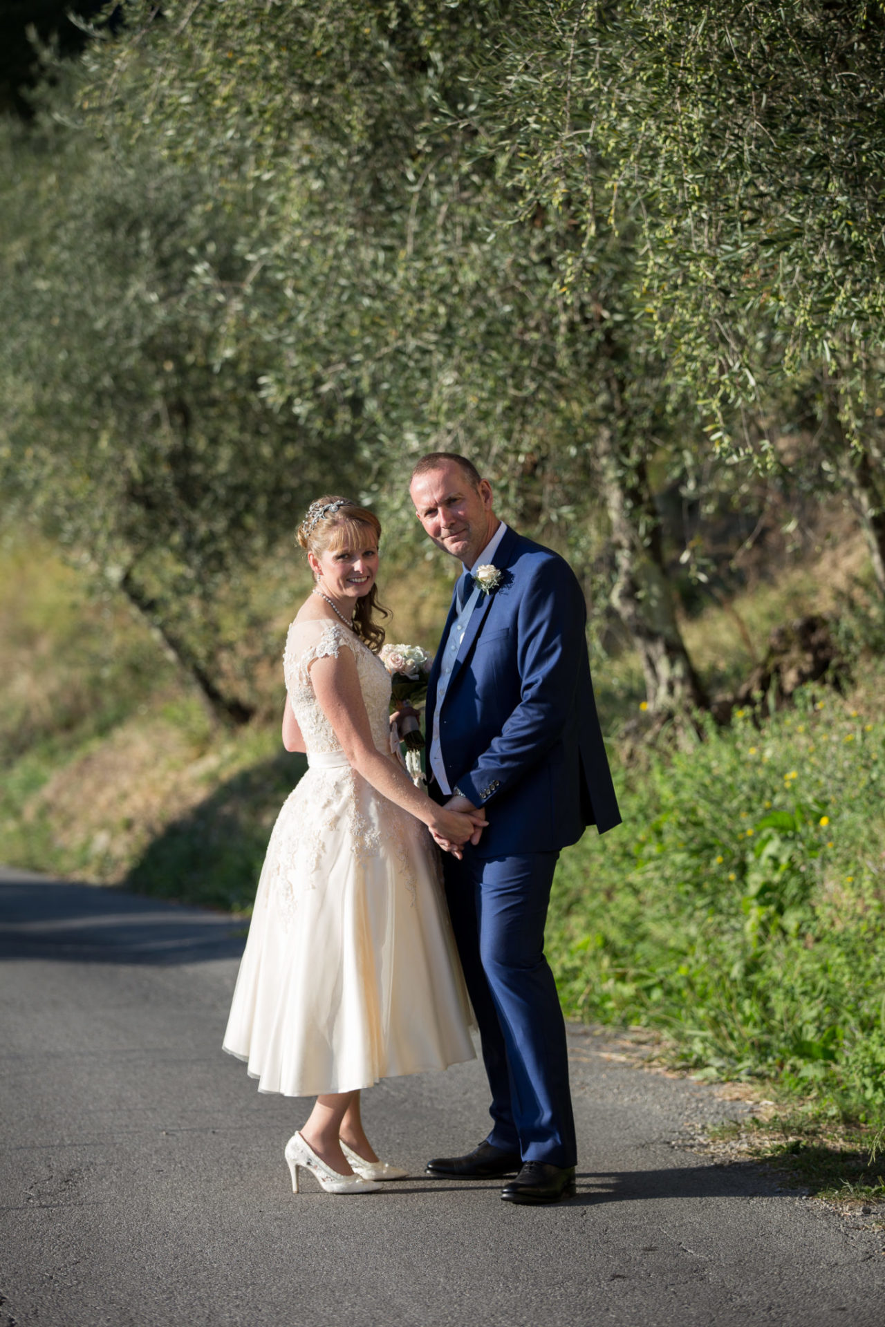 Bride Lisa wearing vintage lace wedding shoes