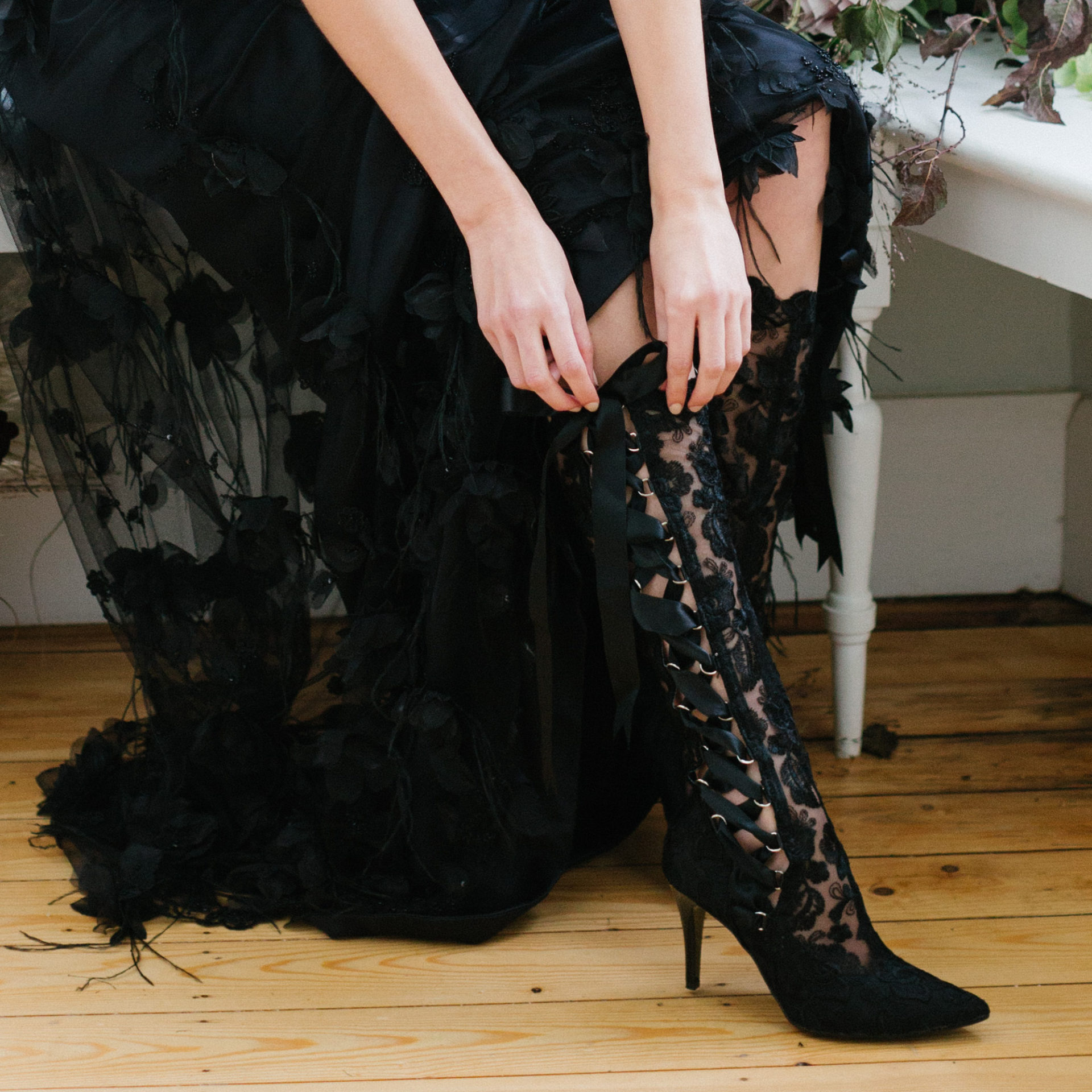 black lace knee high boots