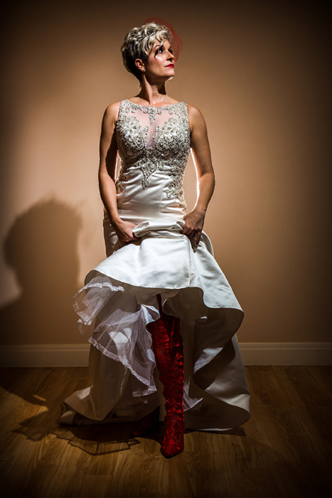 Misty wearing Goodnight Sweetheart Red lace over the knee bridal boots