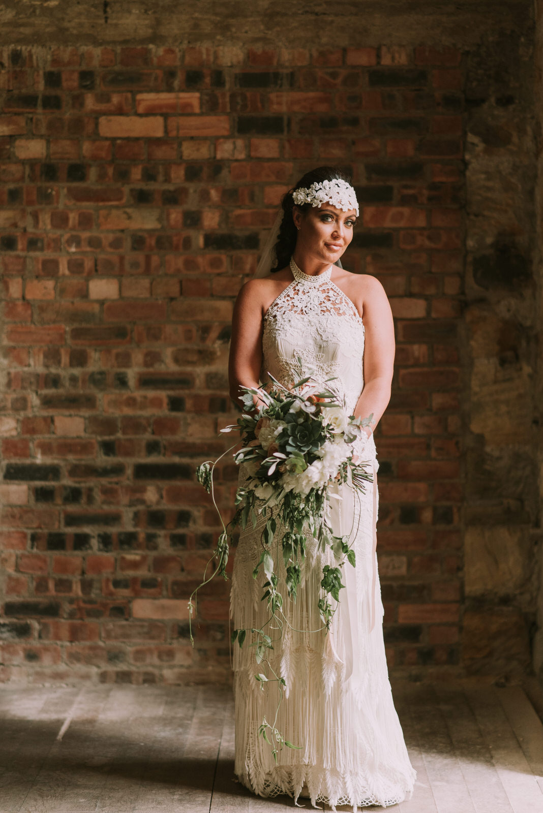 Vintage Bohemian crochet lace wedding dress with feathers 