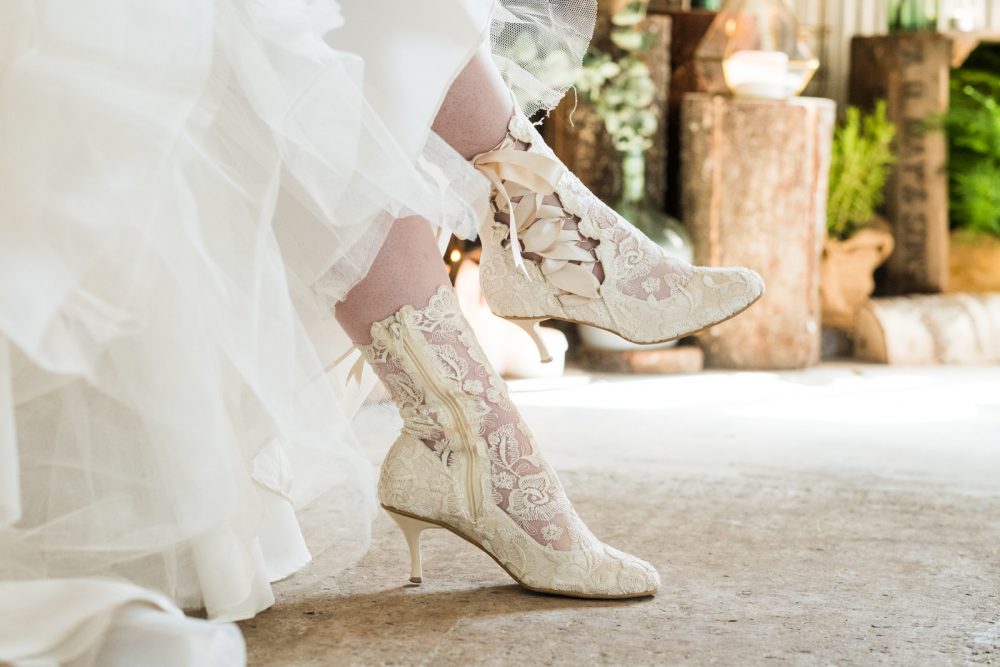 Bride wearing House of Elliot Lottie Elliot Vintage Lace Ankle Boots 