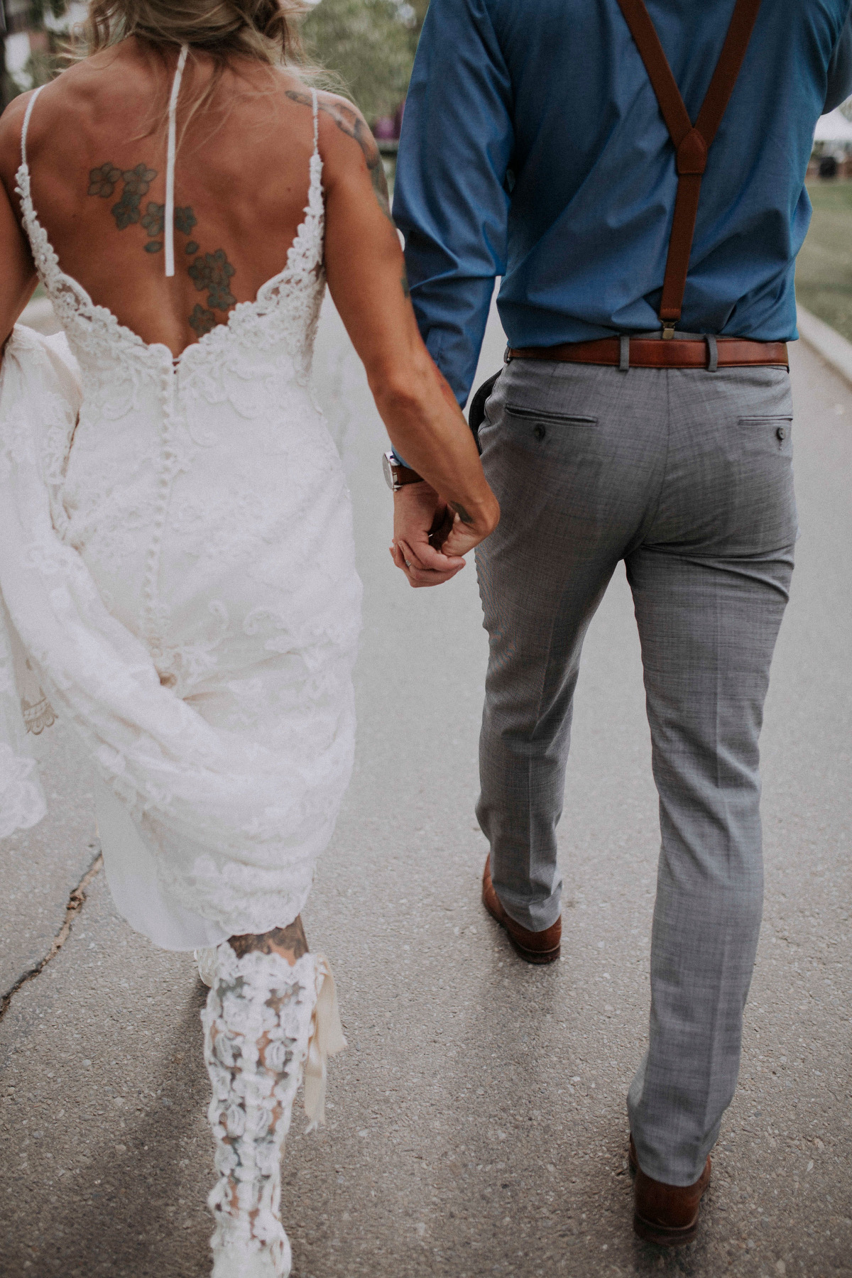 Bride Jessie wearing Evangeline Elliot vintage lace knee high bridal boot