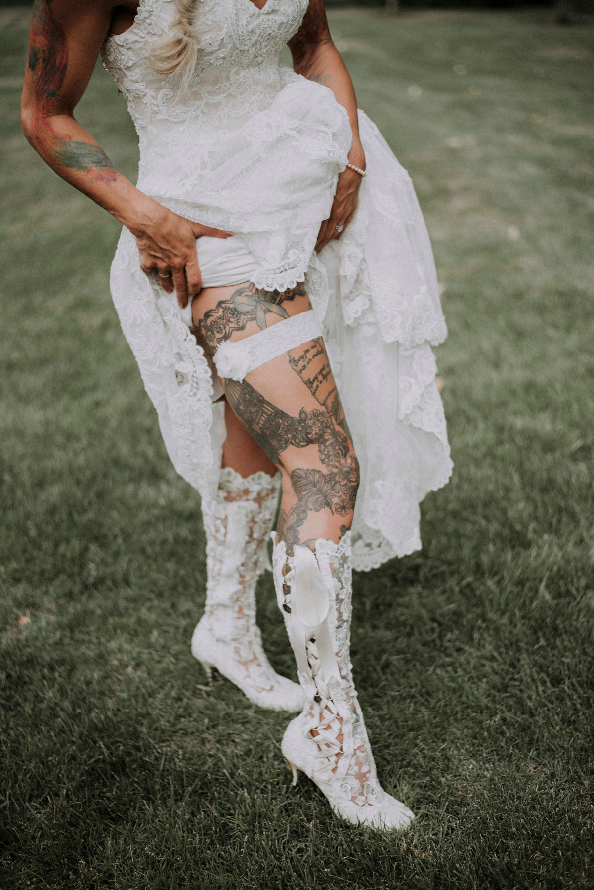 Bride Jessie wearing Evangeline Elliot vintage lace knee high bridal boot