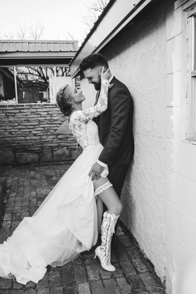 Bride Wrylee wearing our Evangeline Elliot Vintage Lace Boots